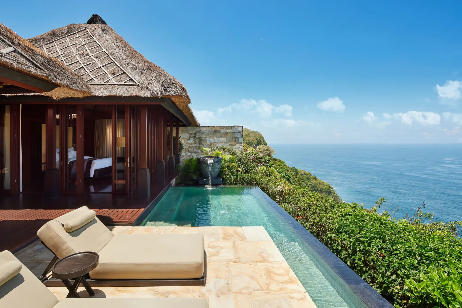 An Ocean Cliff Villa: the infinity pool running to the edge of the cliff and the open sea.