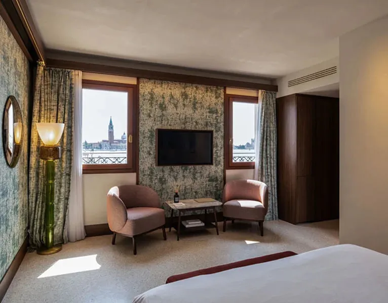 A Lagoon View Junior Suite, with the sitting area and the window on San Giorgio