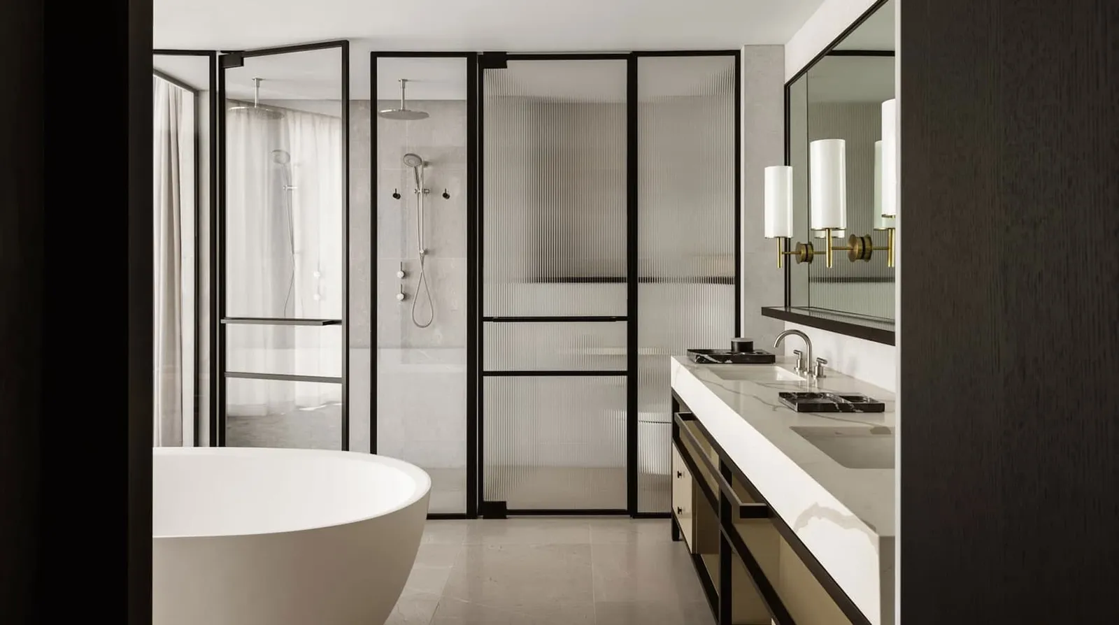 The Liberty Suite’s bathroom: a freestanding bath, a glass shower and a double vanity
