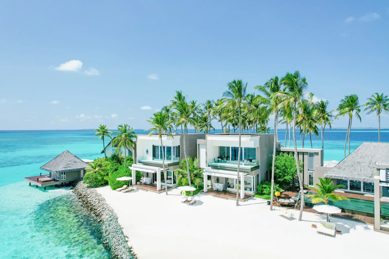 The Private Island residence on the white beach among the palms