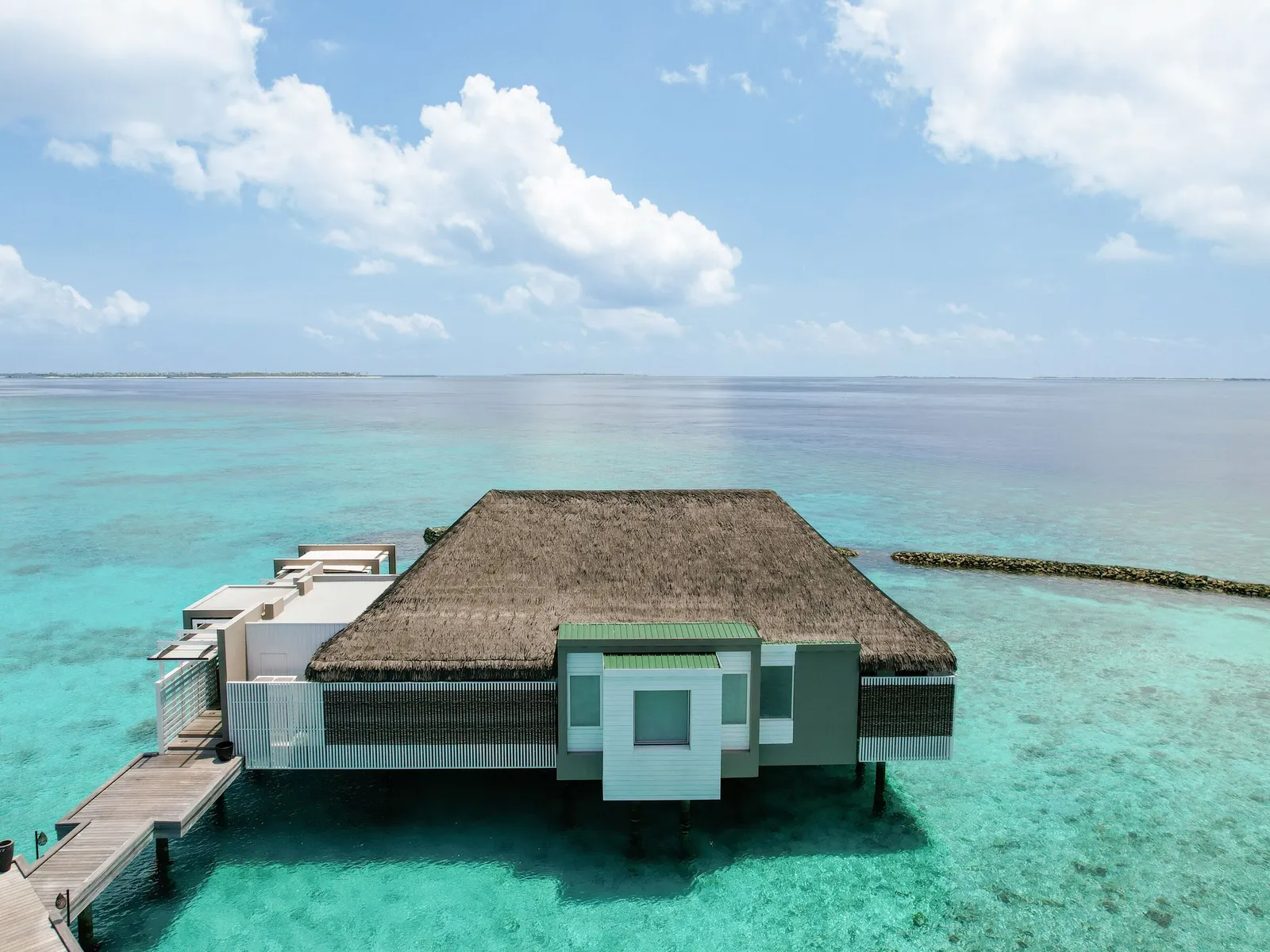 The Horizon Villa, alone at the end of the jetty facing the ocean
