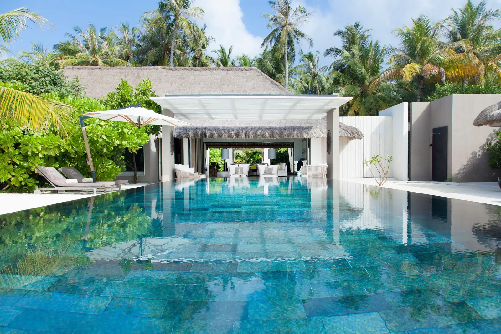 Island Villa: the long pool between the pavilion and the garden