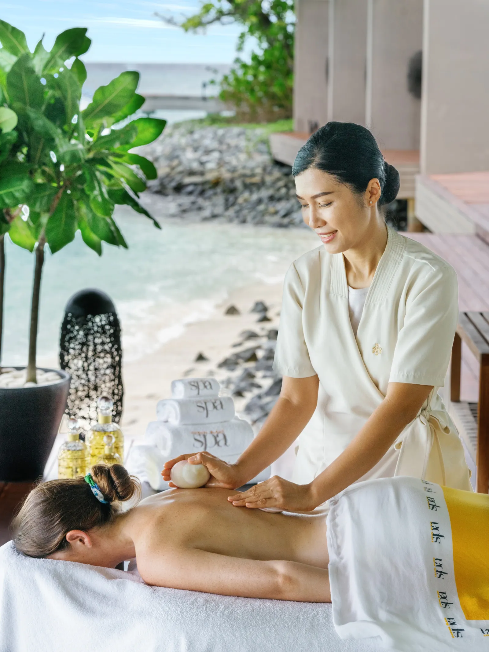 A massage at the spa, the therapist and the Guerlain products