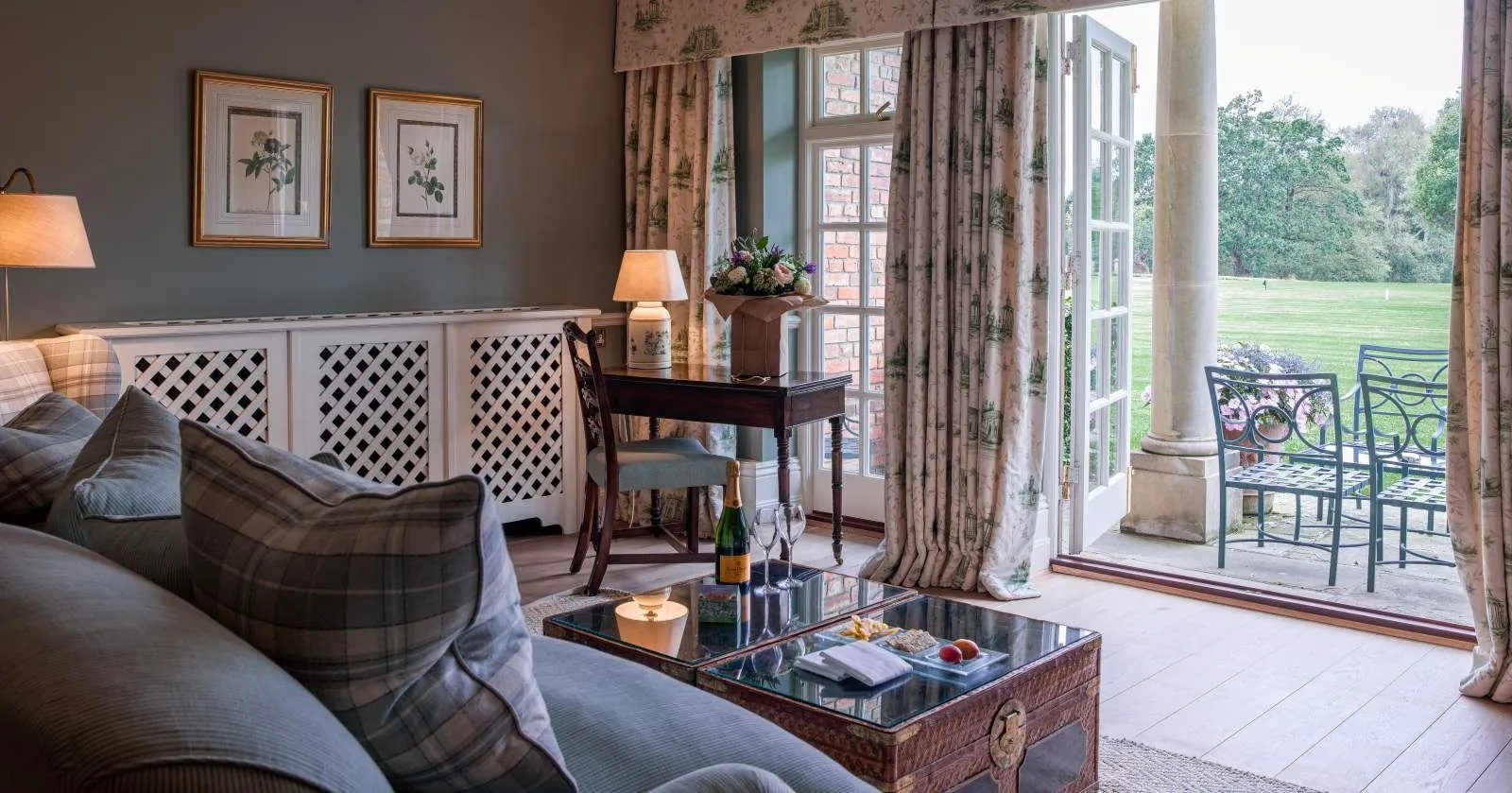 A Croquet Lawn Room’s sitting area open onto the terrace and the lawn