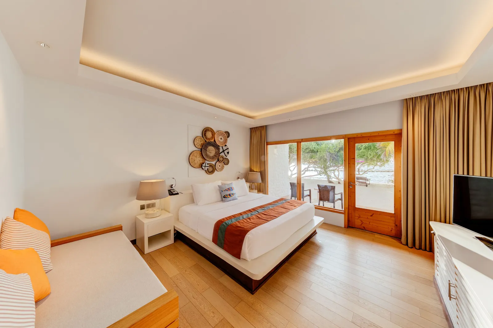 The Superior Room Ocean View with its bed and window facing the sea