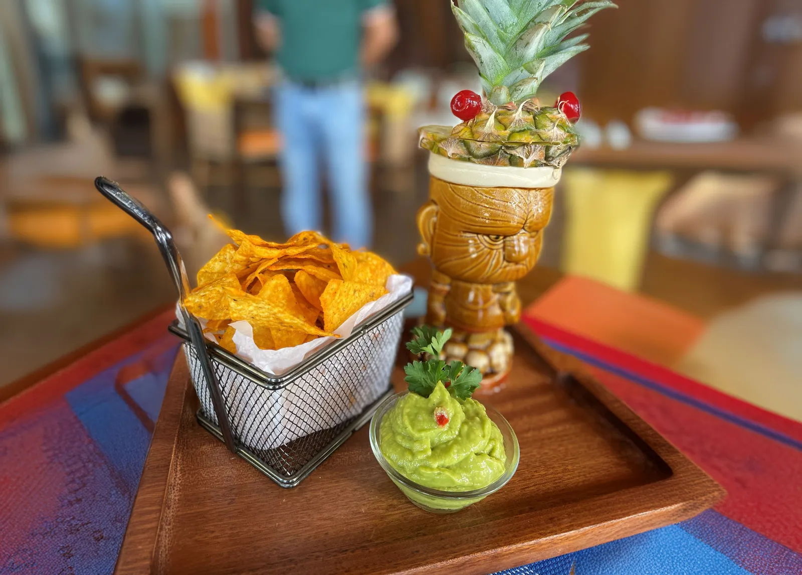 Nachos and cocktails served at the Tex Mex counter