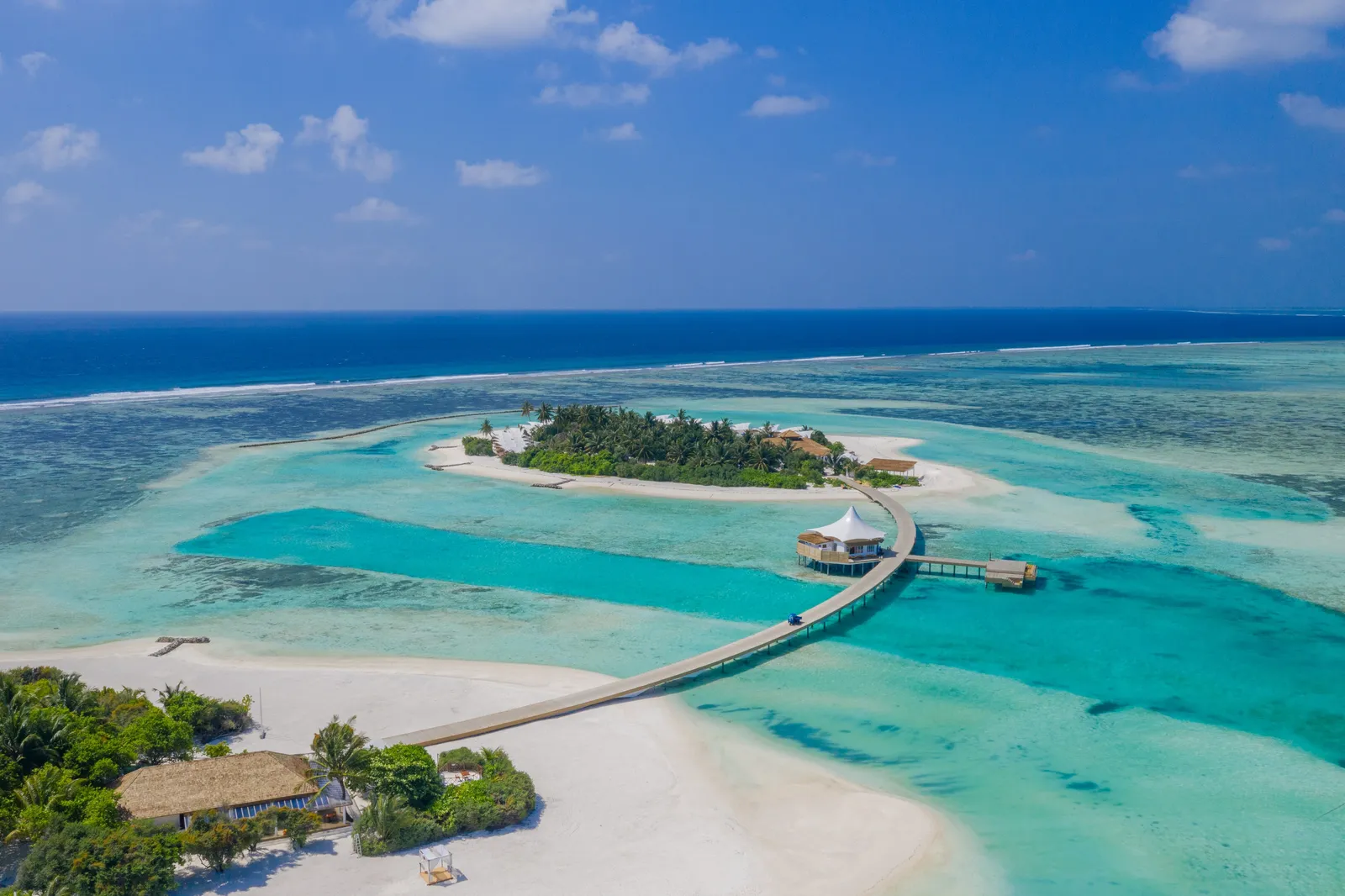 The resort’s 2 islands from the air, joined by a long walkway across the lagoon