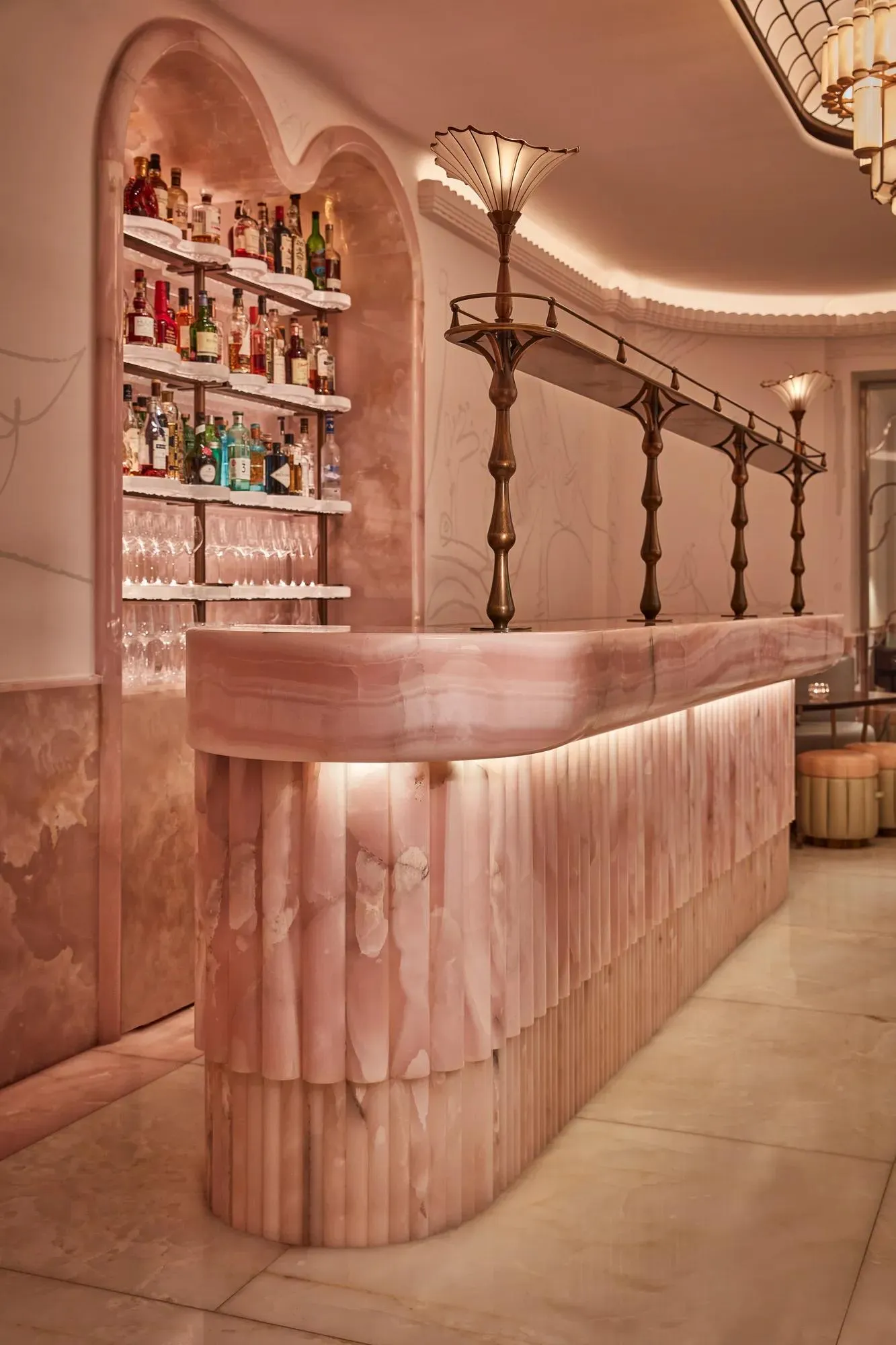 The Painter’s Room: the pink onyx bar, stools and Annie Morris’s colourful works on the walls