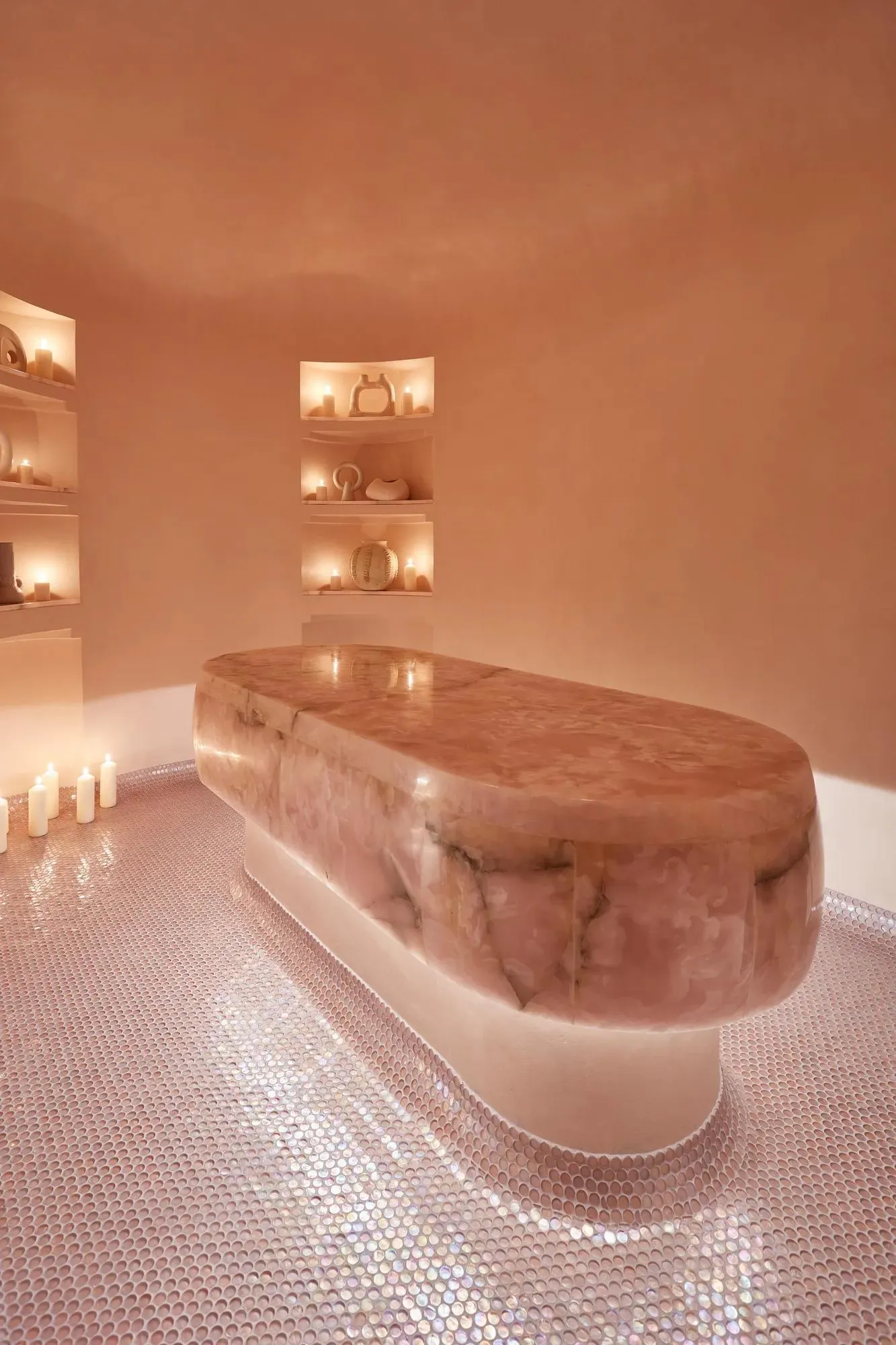 The Pink Room: a pink onyx bed for the hammam in a pink-walled room