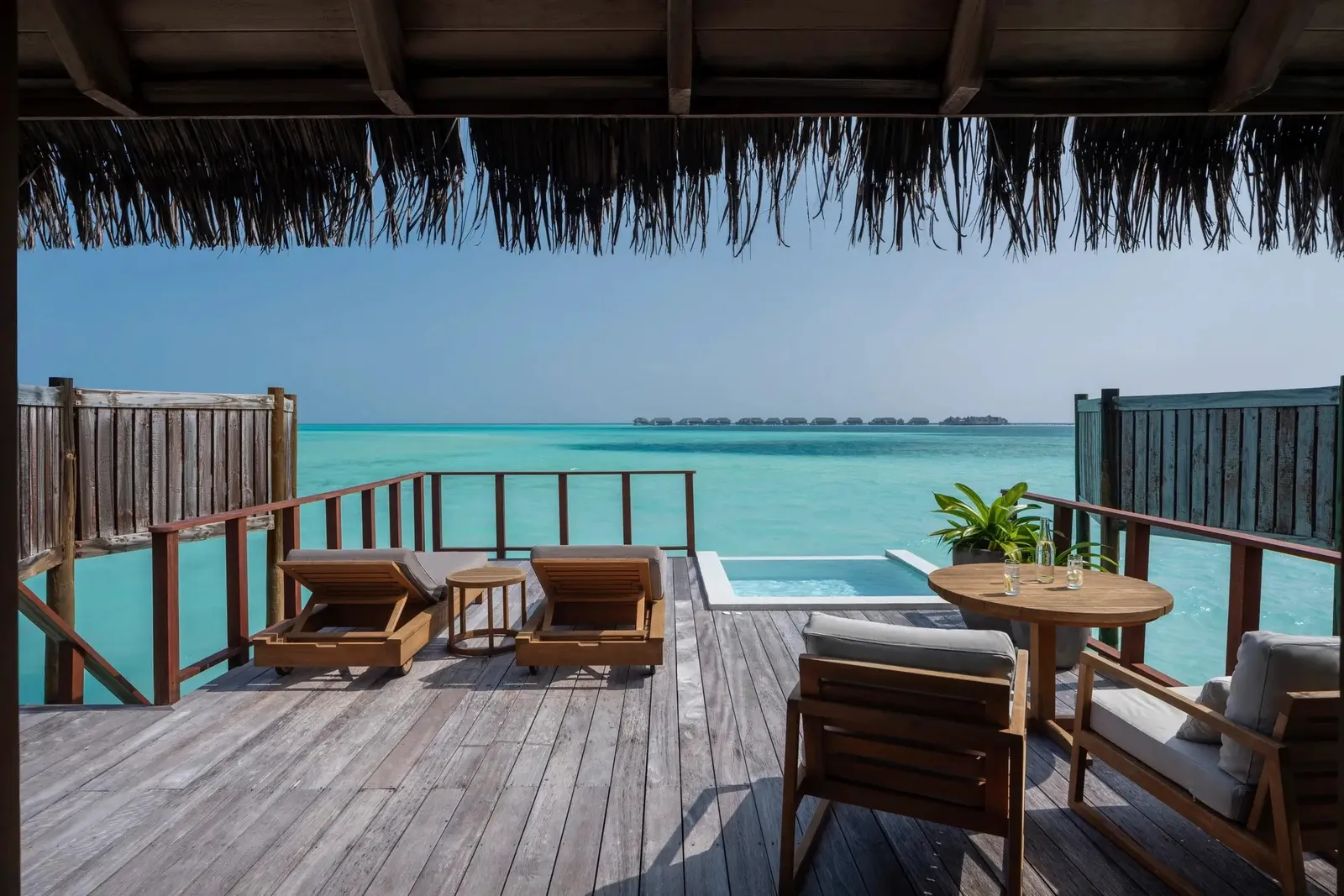 A Sunrise Water Villa’s deck over the lagoon