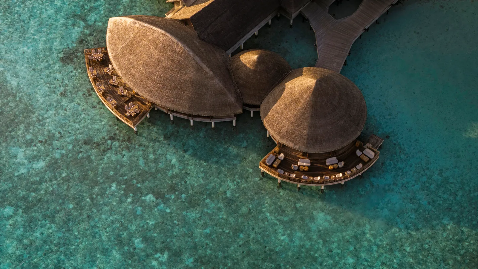 The roof and overwater terrace of Jing restaurant, seen from above.