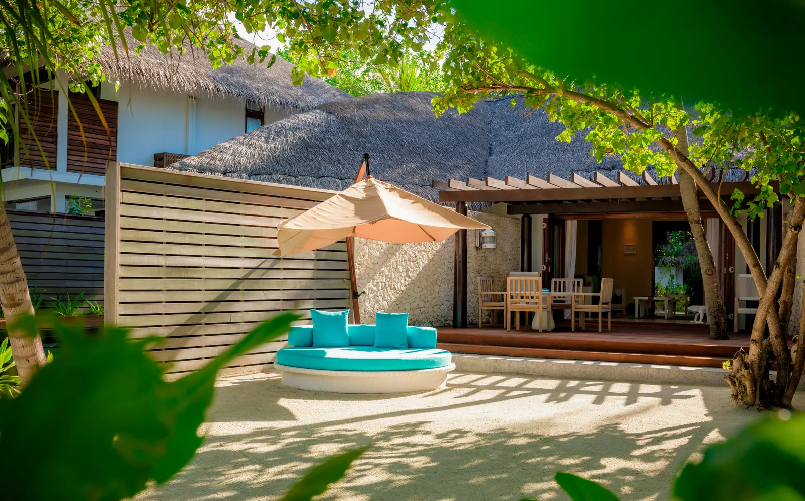The courtyard and outdoor seating of the 2-bedroom Beach Villa.