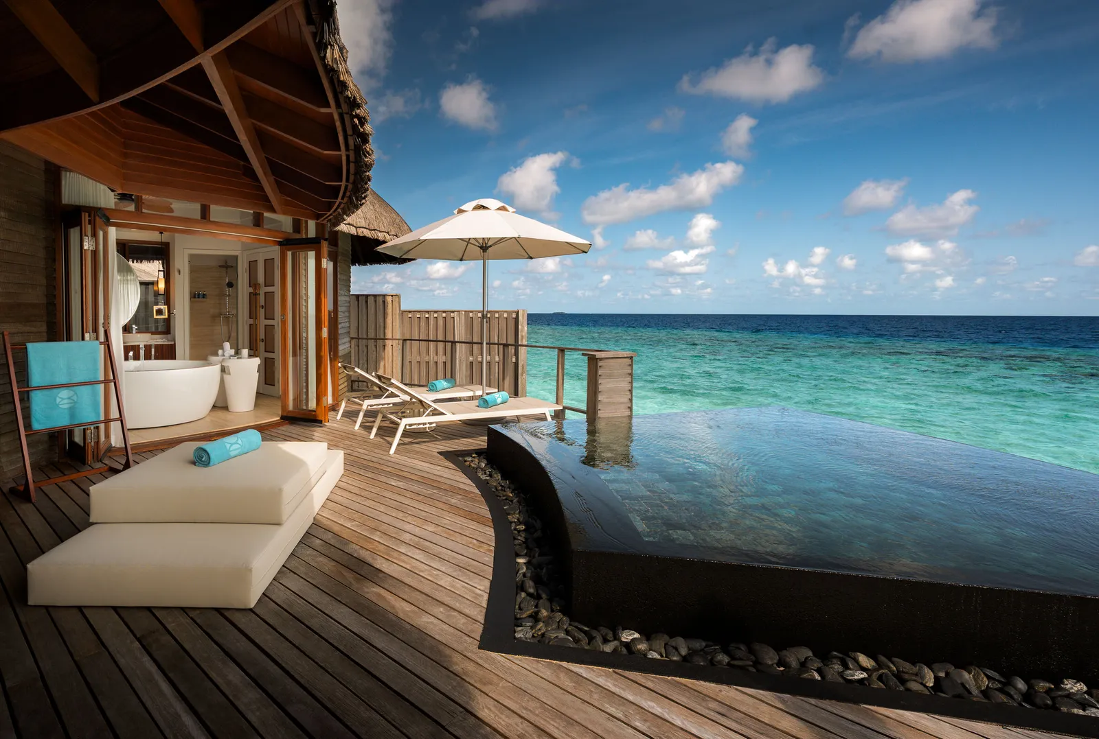 The Water Villa’s private pool and timber terrace, facing the ocean.