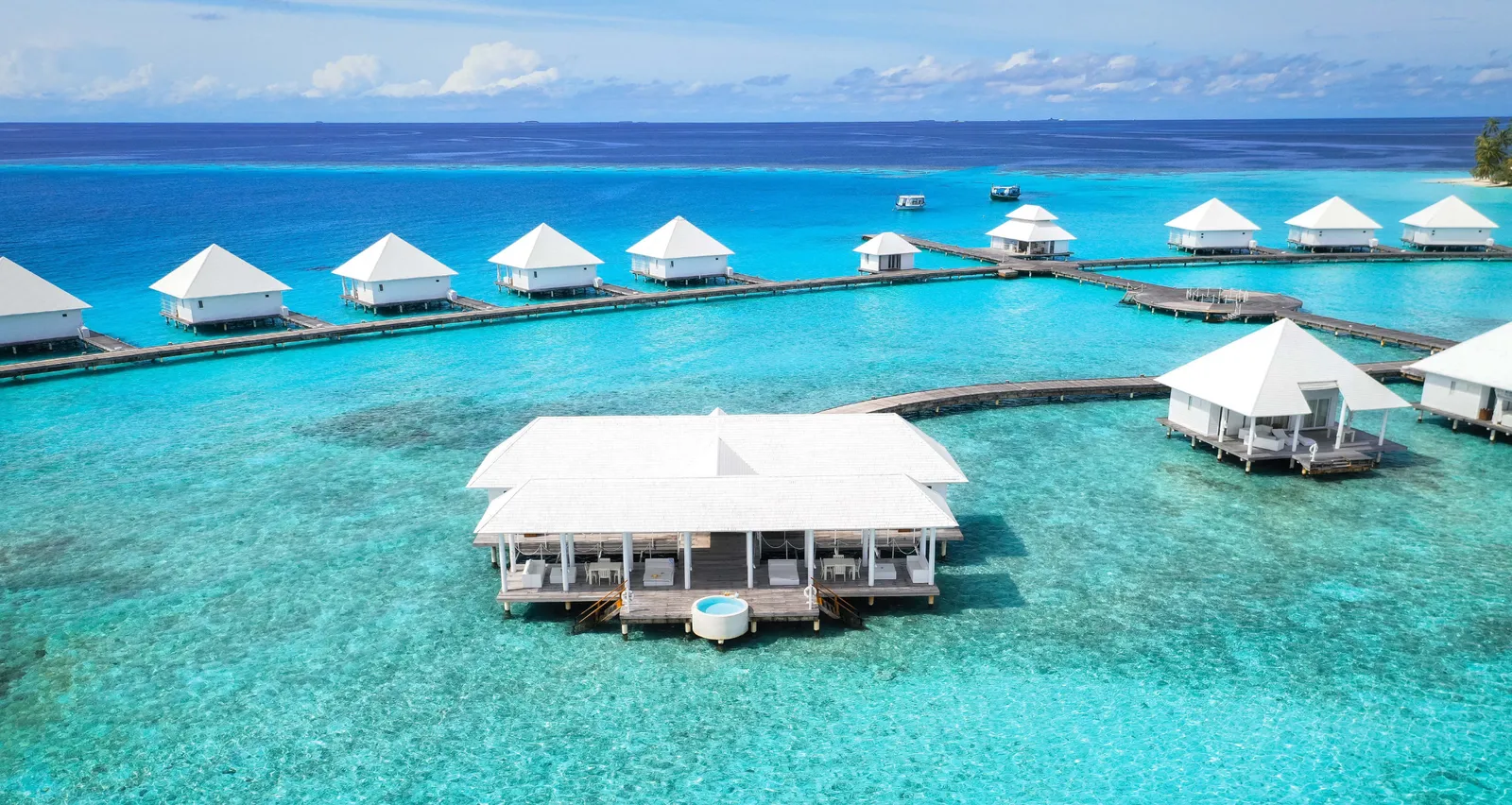 The Two Bedroom Pool Water Villa at the end of the jetty, with the jacuzzi on its deck.
