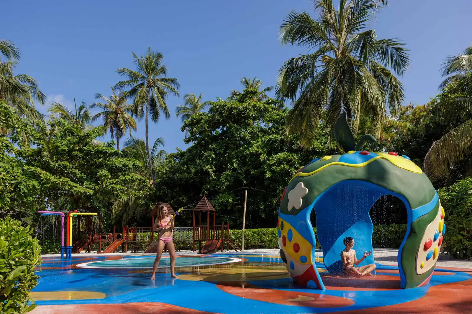 The Dolphin Kids Club’s children’s pool, with its fruit-shaped slide and water games.