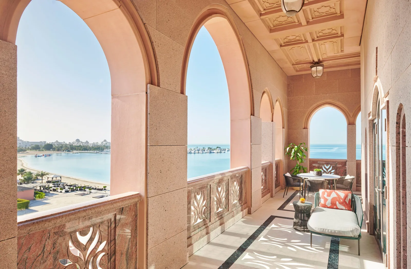 An arched balcony over the sea