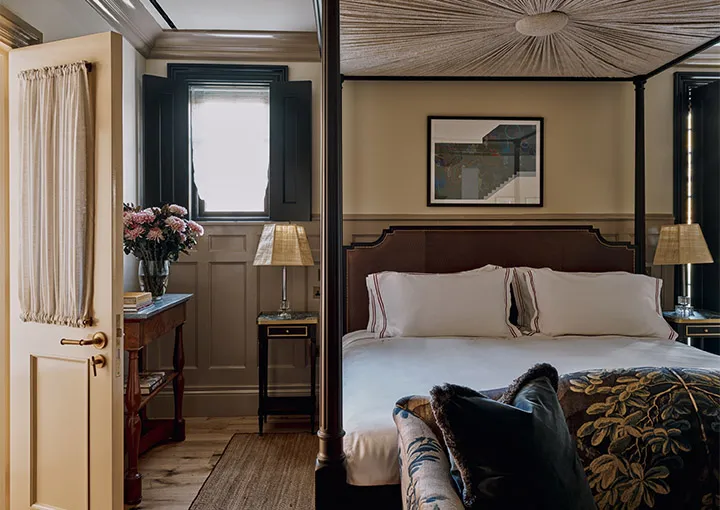 Bluebell House: the main bedroom with its four-poster