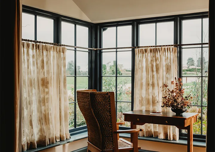 A Stable Suite: the writing desk in the bay window over the south lawn