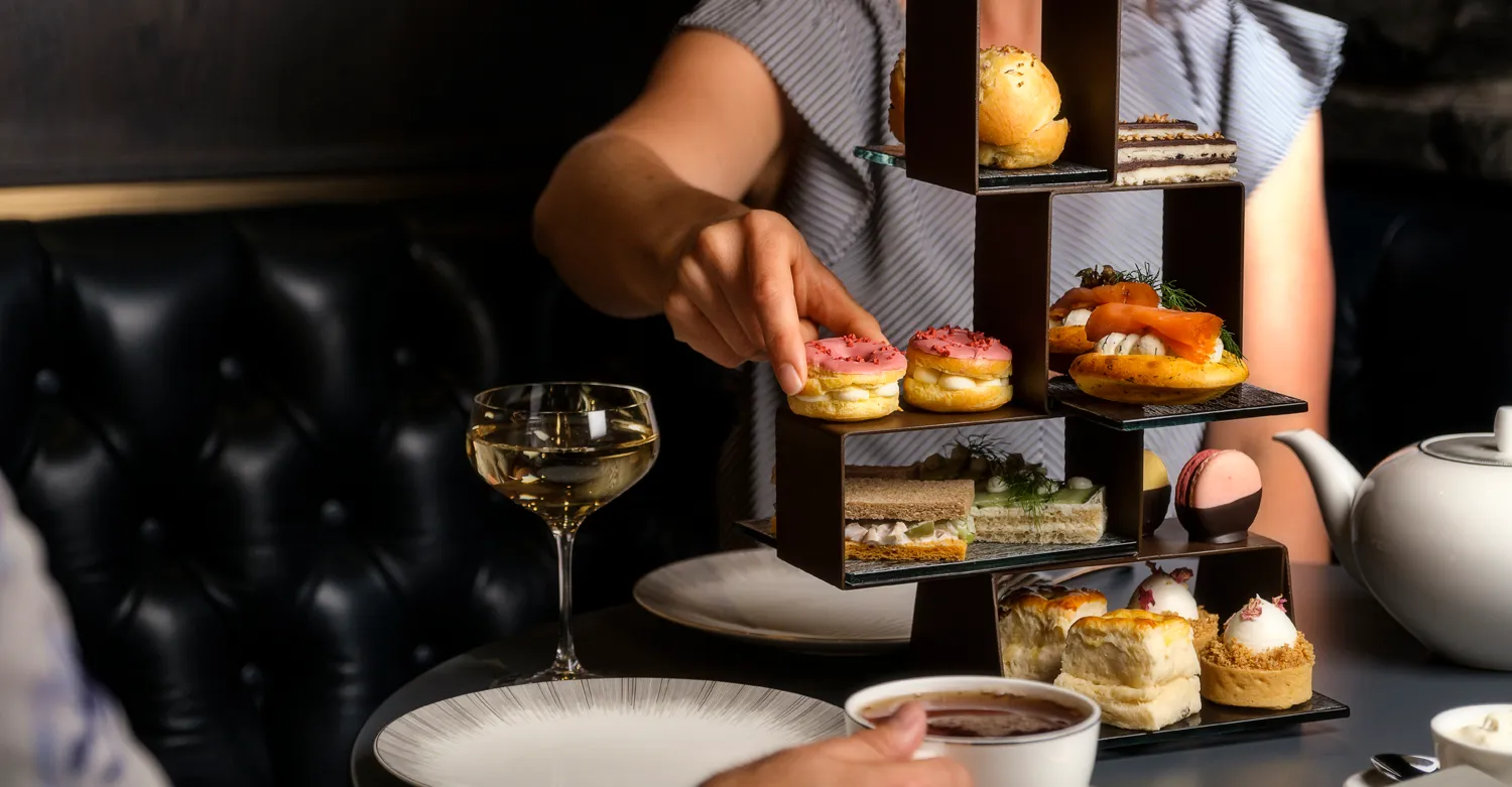 Afternoon tea with stands and pastries at the Rundle Bar