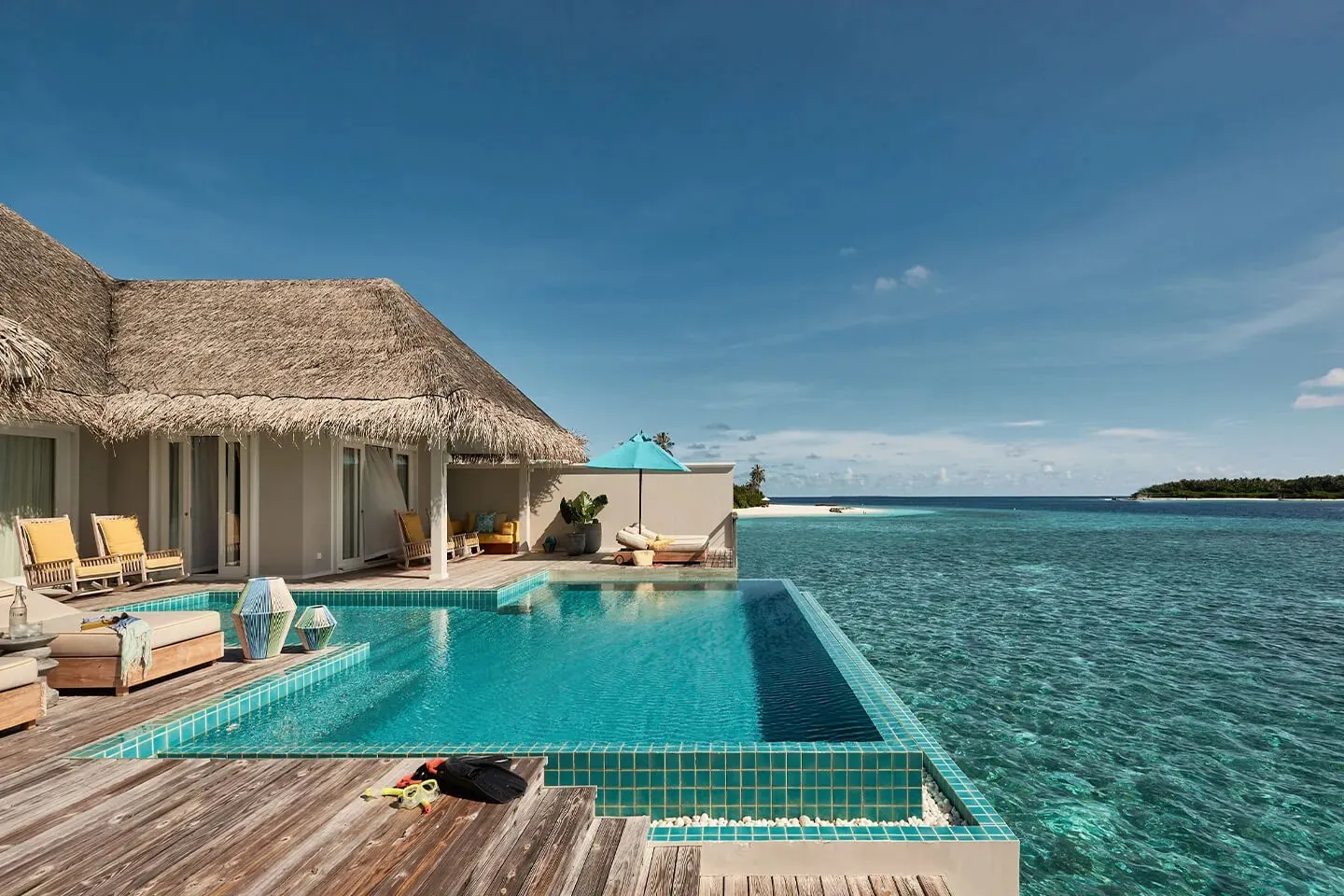 A Two Bedroom Water Villa with Pool: the pool on the deck, open sea ahead