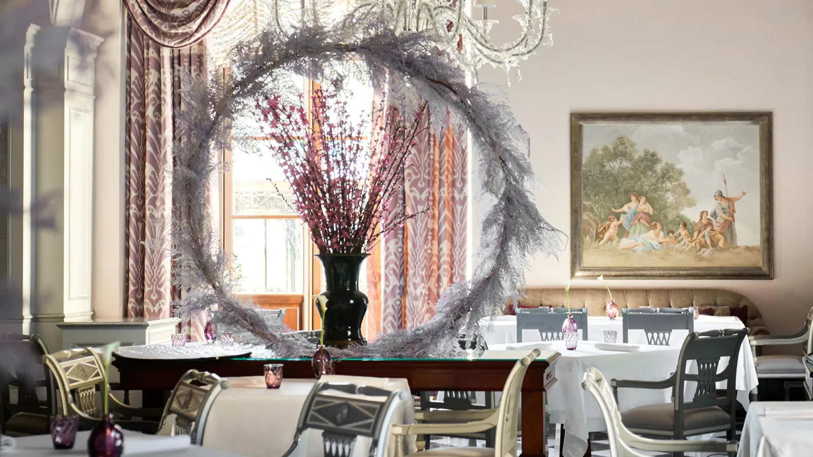 Il Palagio’s dining room with flowers and laid tables