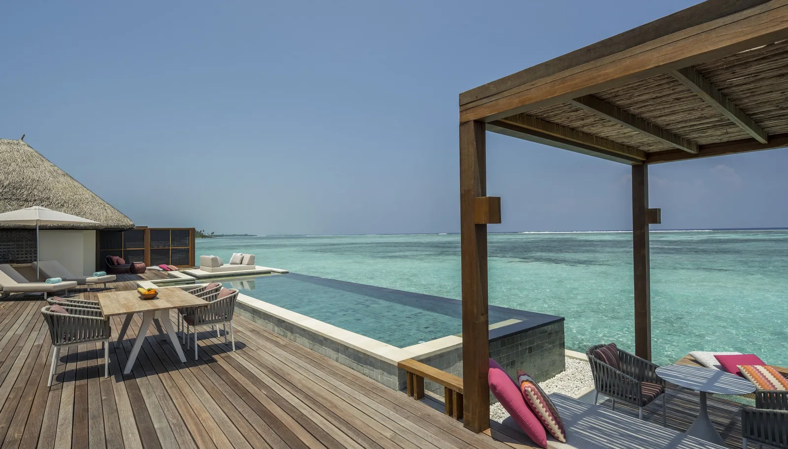 The Sunrise Two-Bedroom Water Suite’s large deck over the lagoon