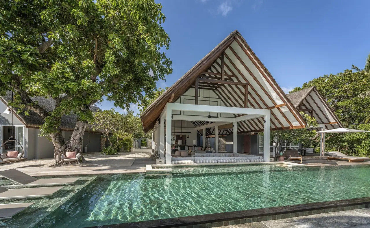 The Four-Bedroom Landaa Estate: the residence and its pool