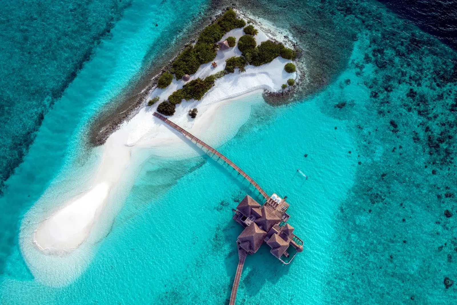 The Gili Lagoon Retreat from the air, beside the sandy islet of Three Palm