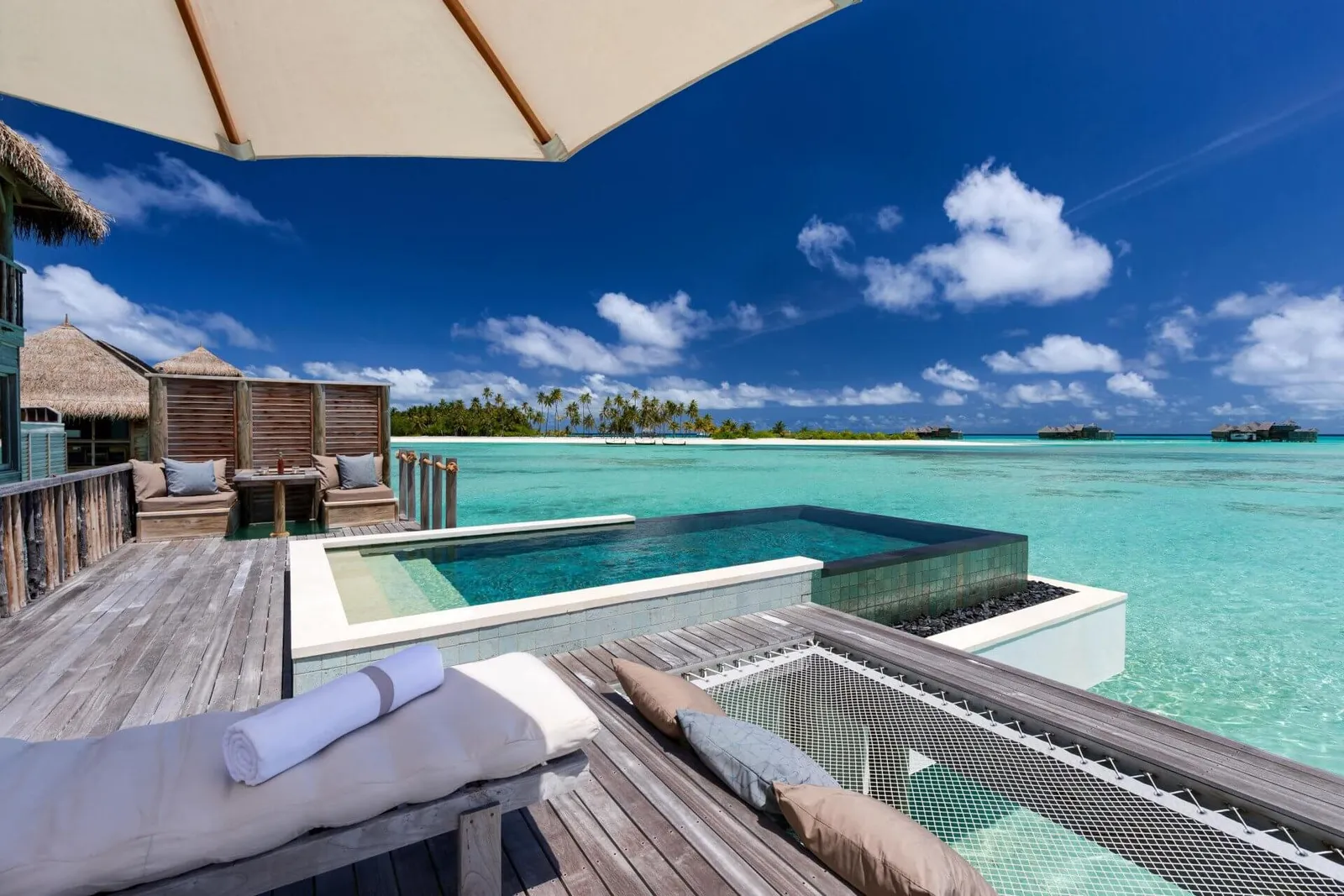 A Villa Suite with Pool’s infinity pool, the sea beyond its edge