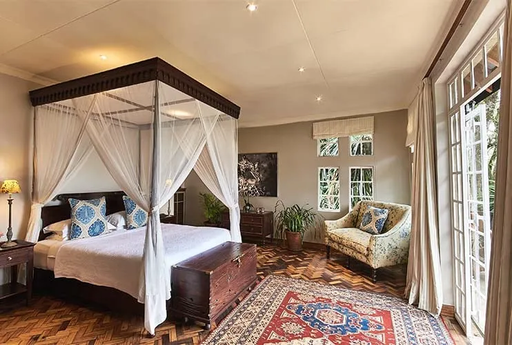 Official photograph of the Karen Blixen Suite room at Giraffe Manor