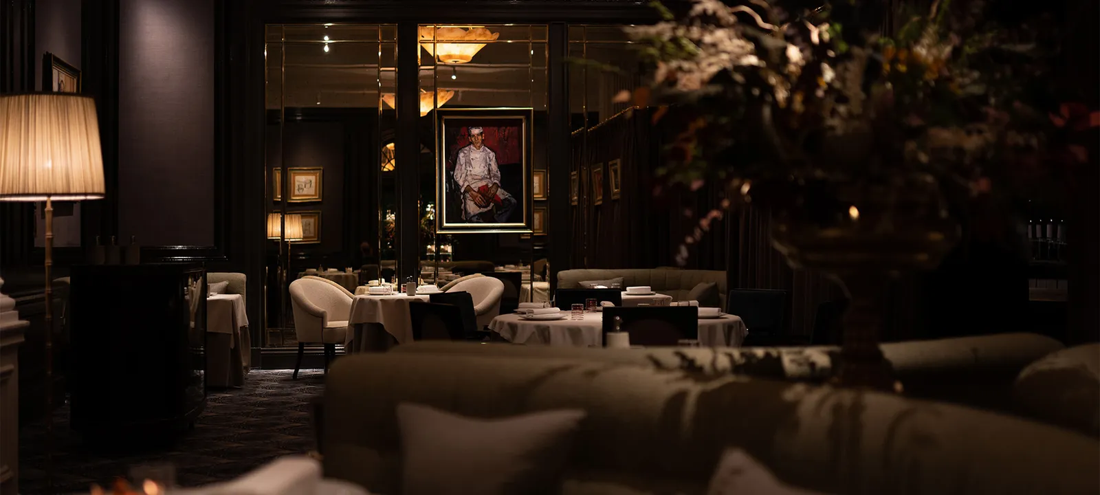 Andrew Fairlie’s dark dining room, wood panelling and low lights