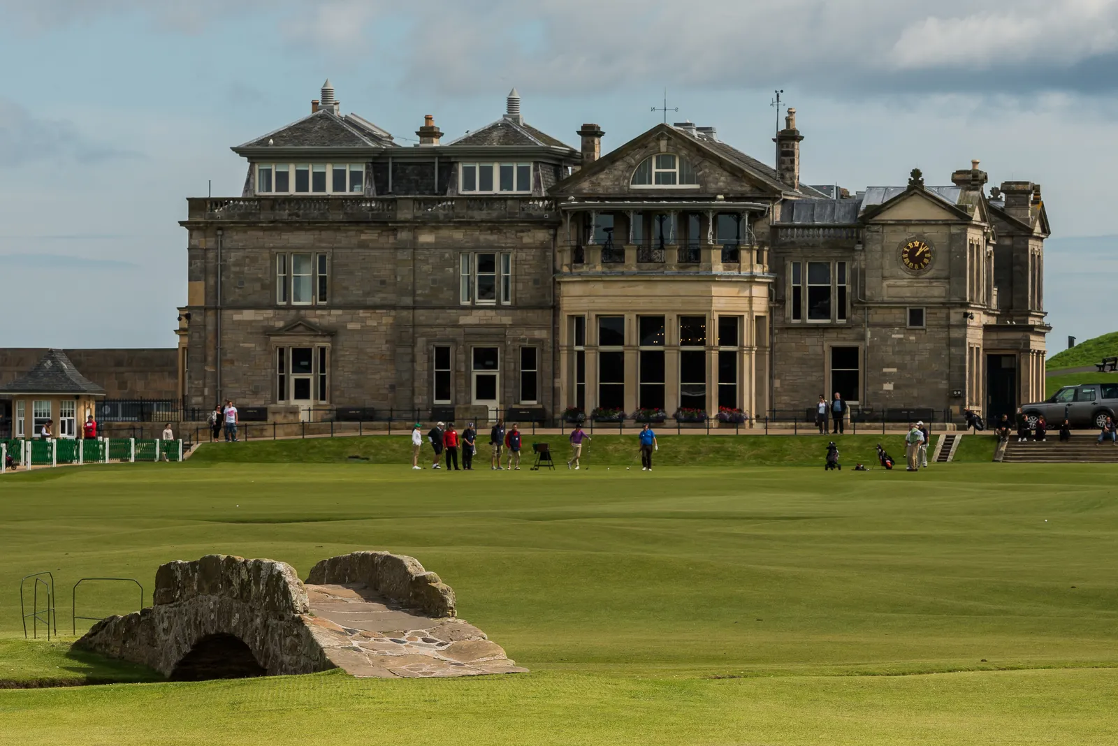 The Swilcan Bridge and the R&A clubhouse on the Old Course