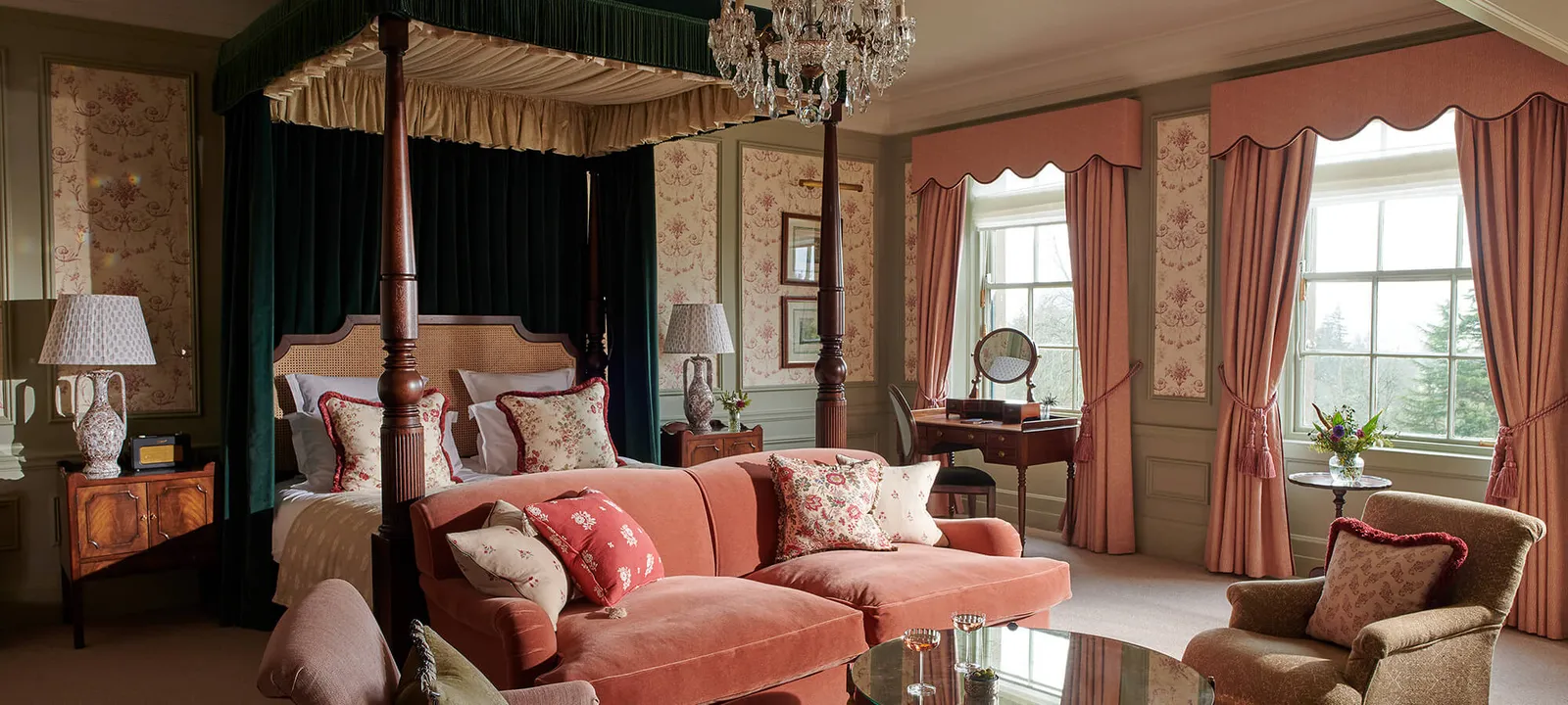 The Royal Lochnagar: a four-poster, pink curtains and a sofa