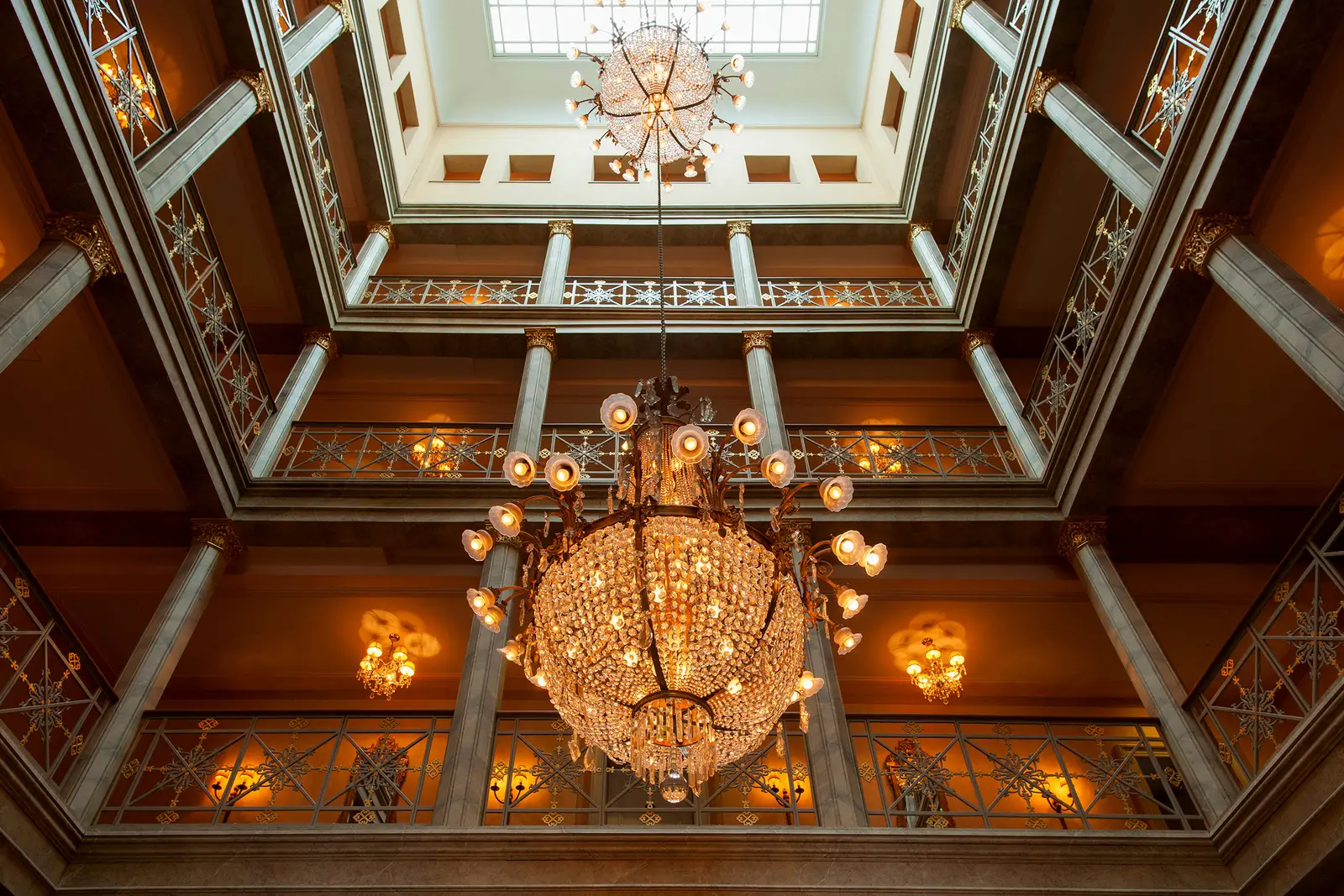 The crystal chandelier in the galleried inner atrium
