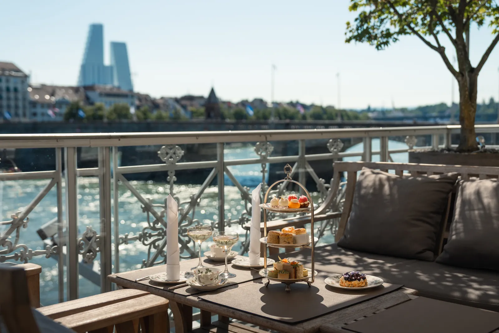 Afternoon tea on the terrace, with the Rhine beyond the railing