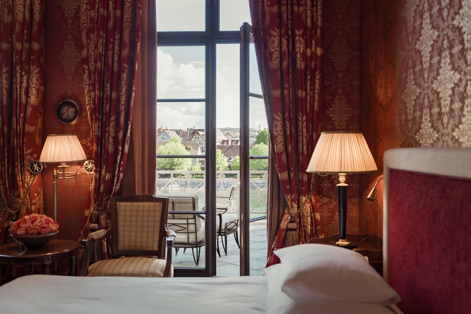 The open French window to the River King Room Balcony balcony