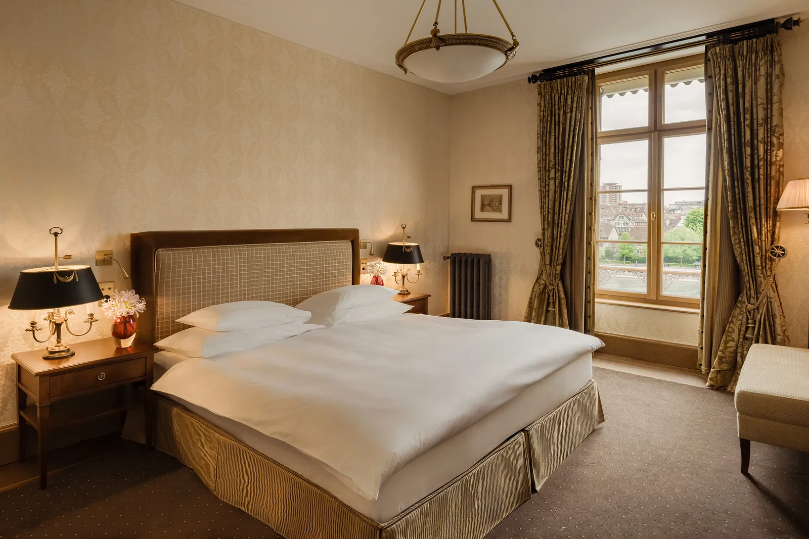 The River Suite bedroom with its window on the river