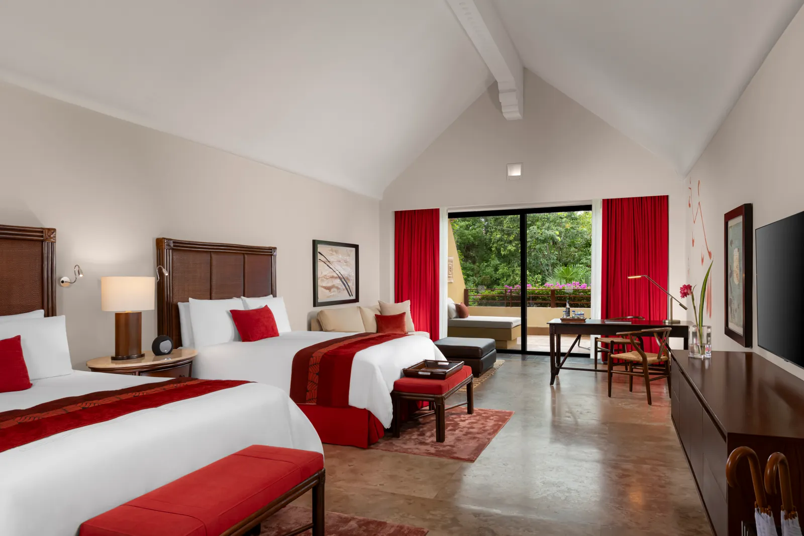 Zen Grand Family Suite bedroom with 2 beds and windows onto greenery