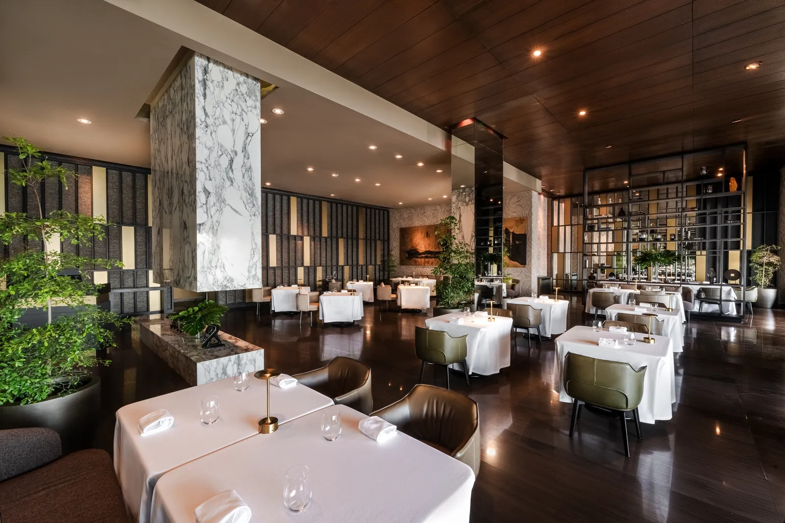Set tables and tall windows at Cocina de Autor