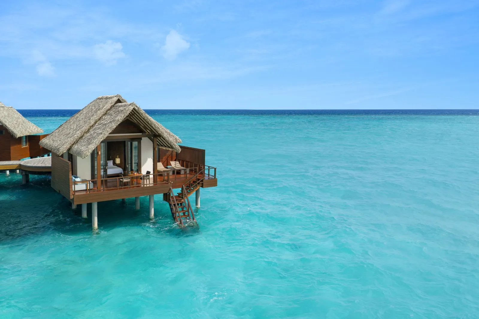 Furnished Ocean Villa veranda and lagoon steps