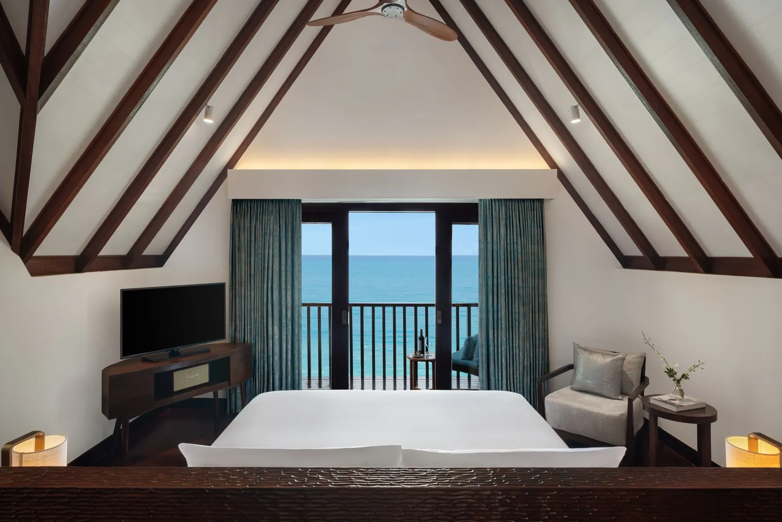 Ocean Suite upper bedroom and sea-facing balcony