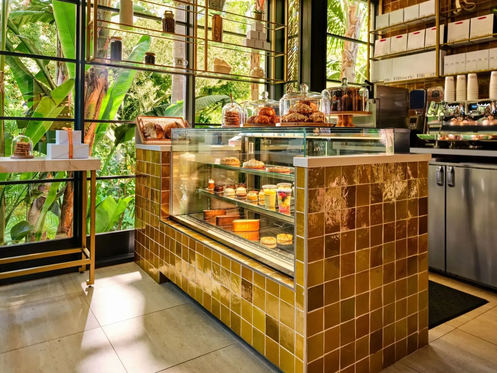 The Pâtisserie counter with its cake cabinets and honey-coloured tiles