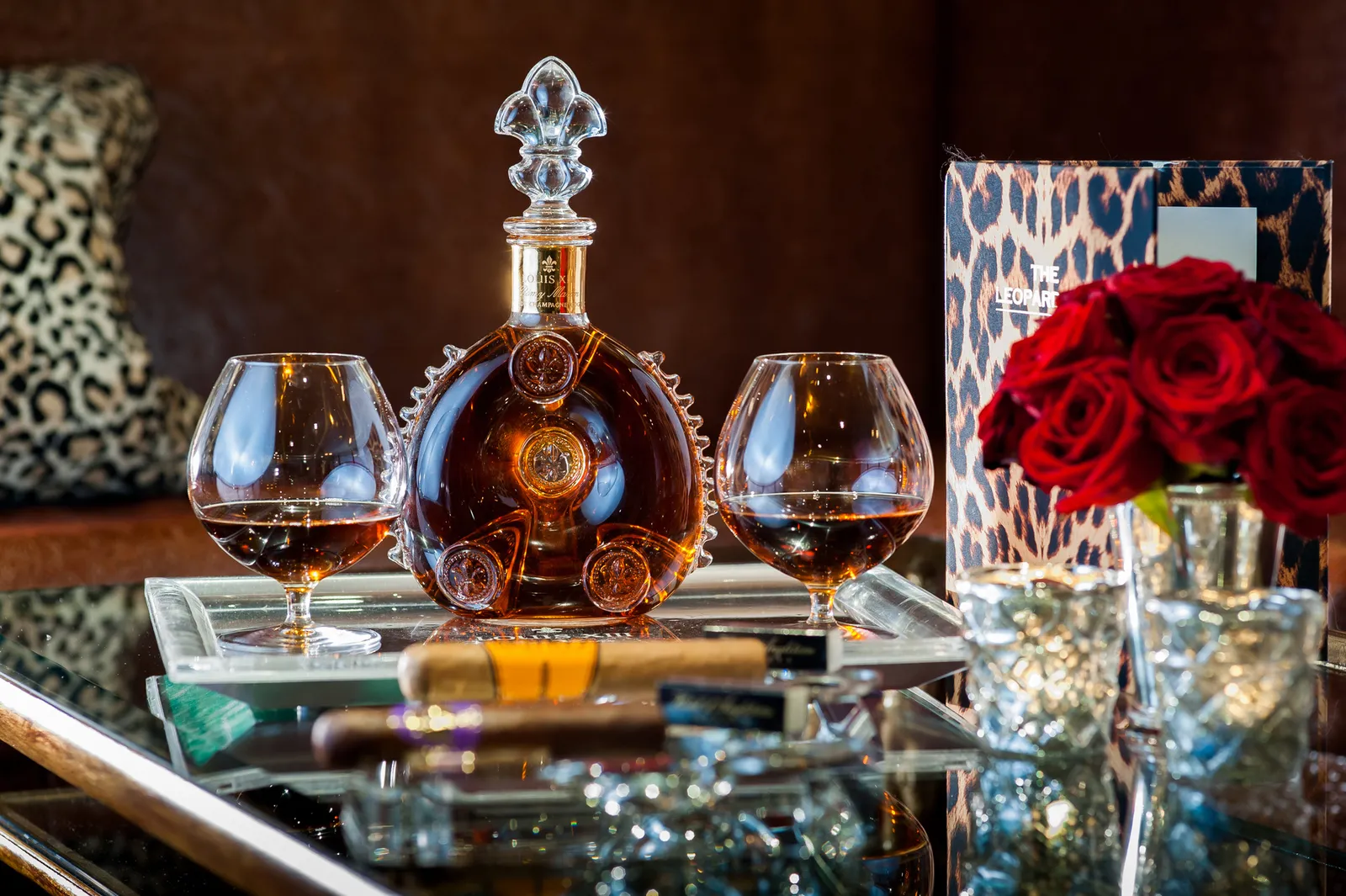 A cognac decanter and 2 glasses in the Cigar Lounge