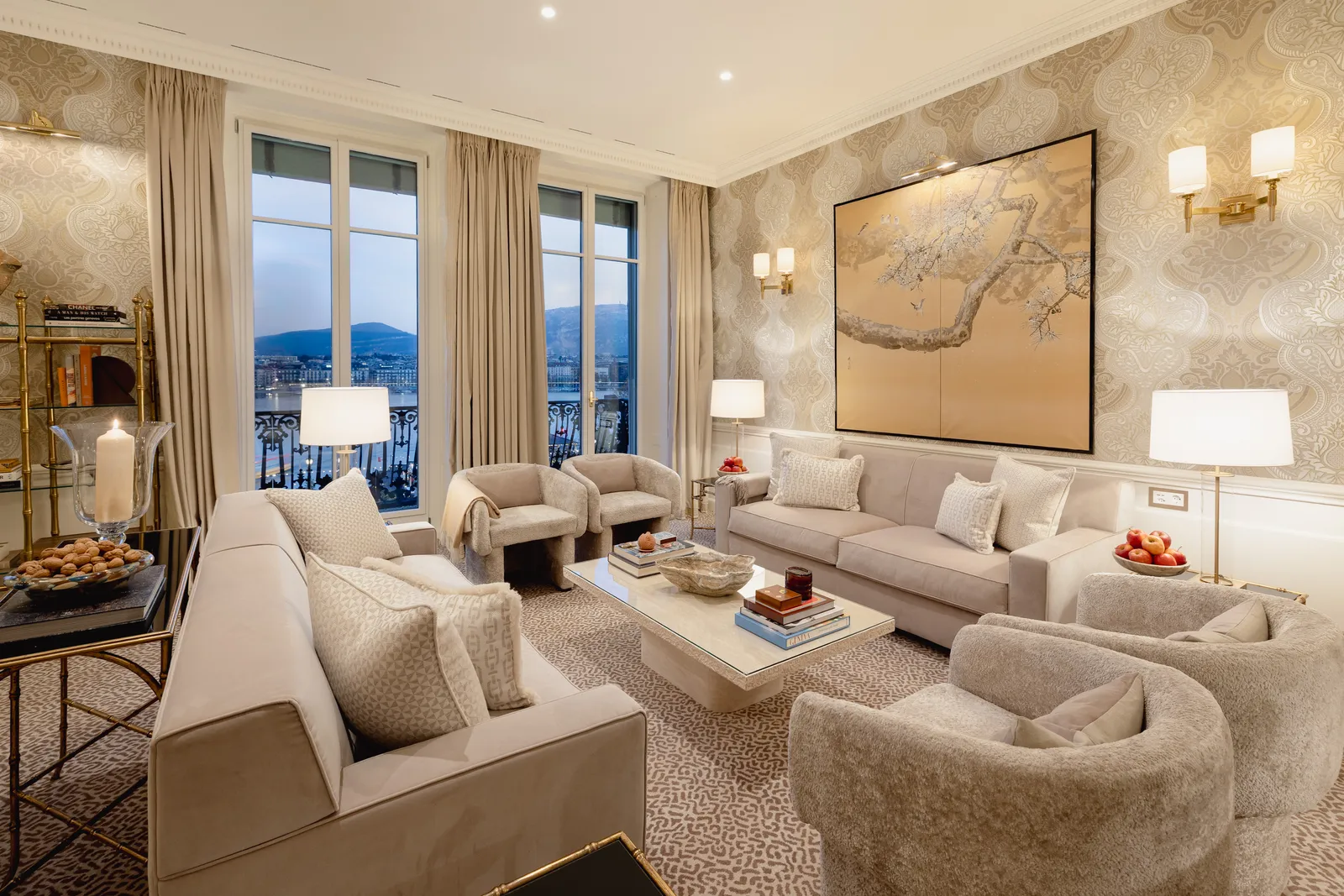 The Beatrice Suite lounge, with windows on the lake