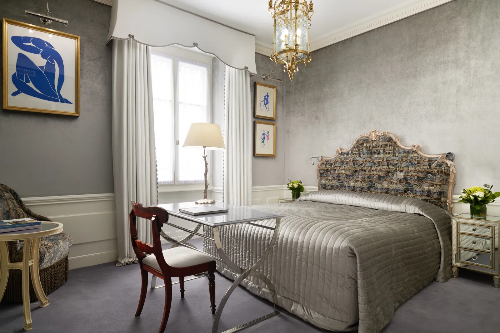 A Classic Queen, with its carved headboard