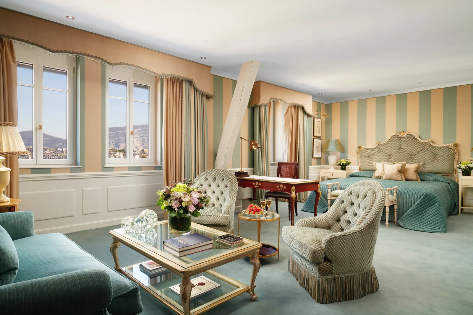 A Junior Suite Lake View sitting area, with windows on the lake