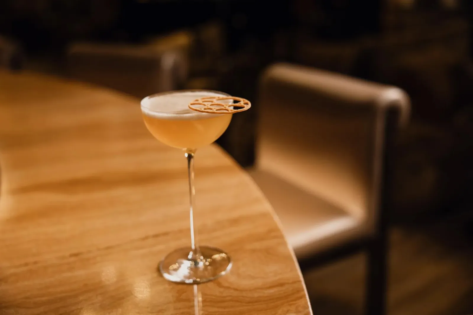 A cocktail on a wooden table