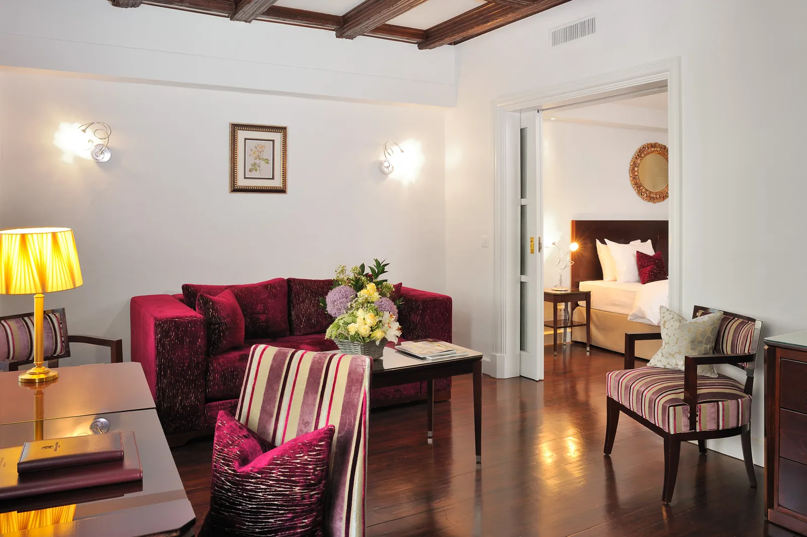 A Junior Suite with its sitting area and bedroom