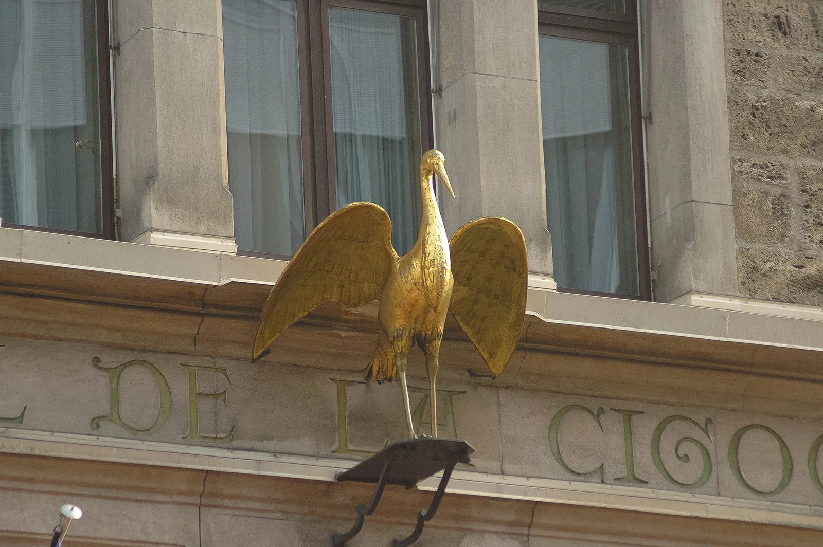 The golden stork on the façade