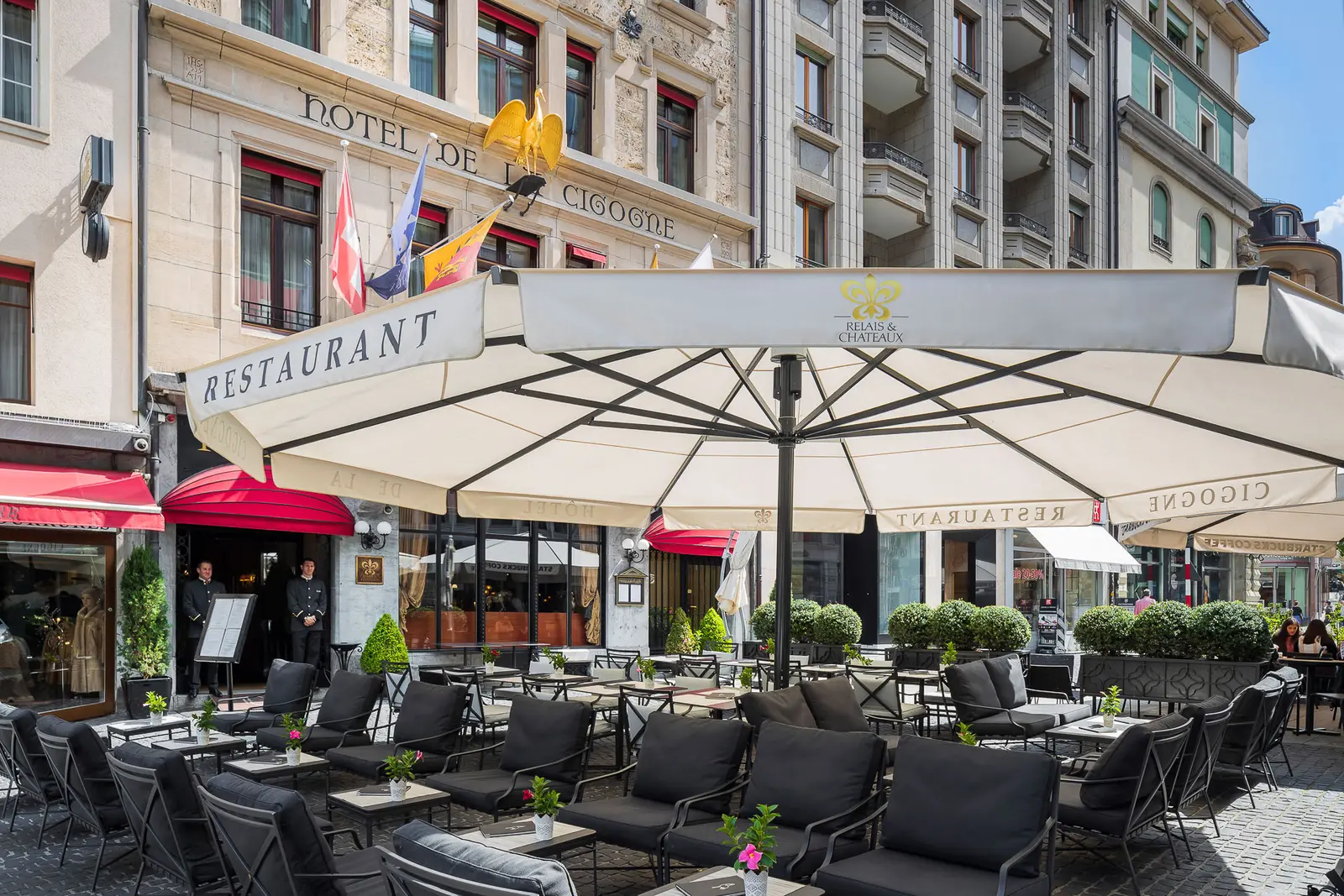 The terrace on Place Longemalle, under the parasols
